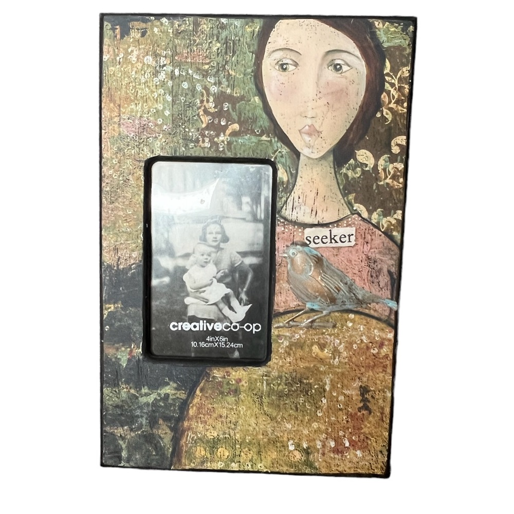 Picture frame “seeker” metal bird adornment